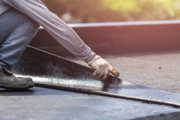 Professional Basement Waterproofing technician working in Burlington, WI